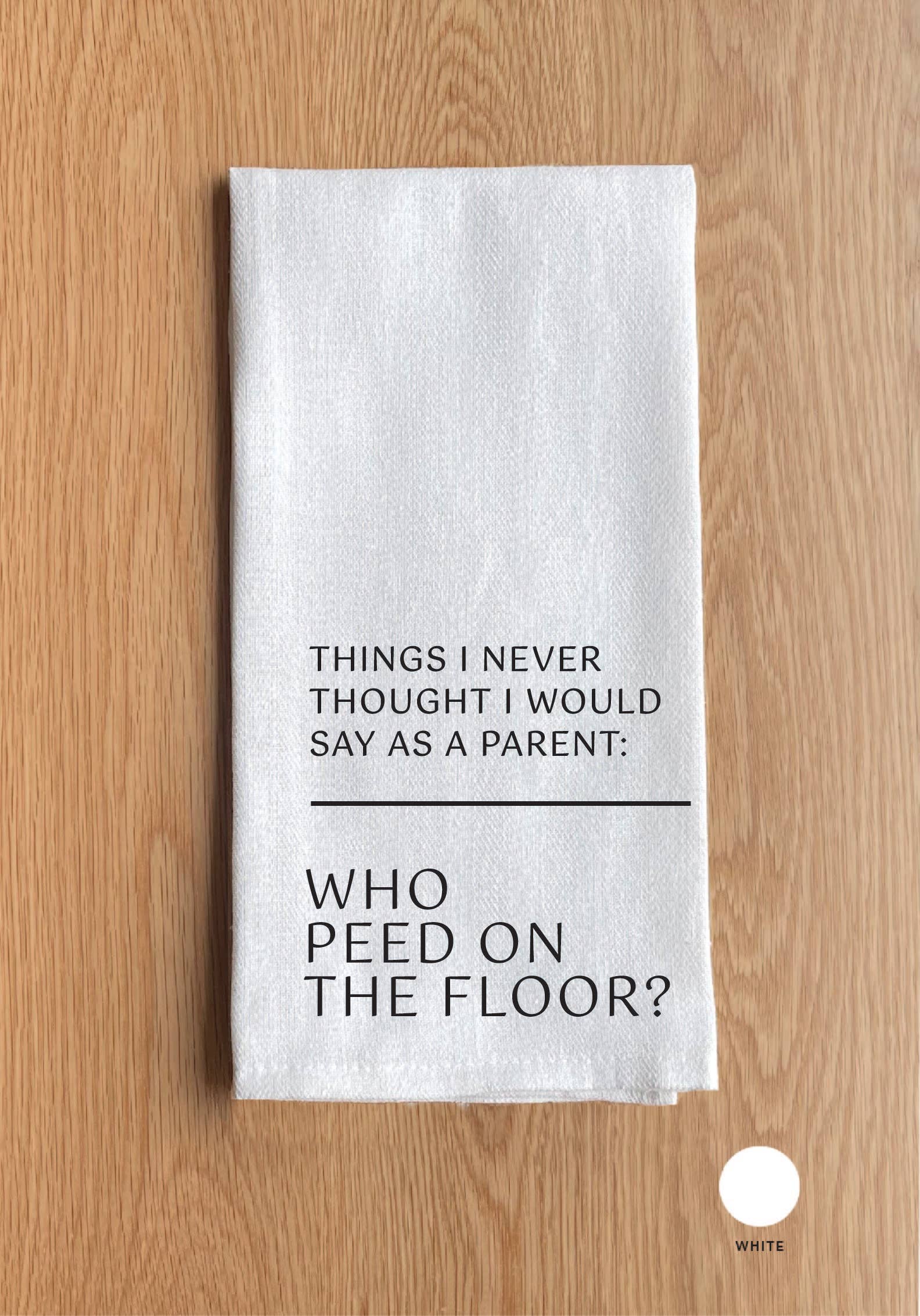… Who peed on the floor?  White Kitchen Towel